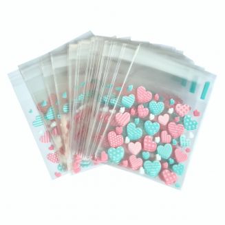 Fako Bijoux® - 100x Uitdeelzakjes - Cellofaan Plastic Traktatie Kado Zakjes - Snoepzakjes - Hartjes Roze/Groen - 7x7cm