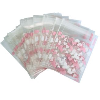 Fako Bijoux® - 200x Uitdeelzakjes - Cellofaan Plastic Traktatie Kado Zakjes - Snoepzakjes - Hartjes Roze/Wit - 7x7cm